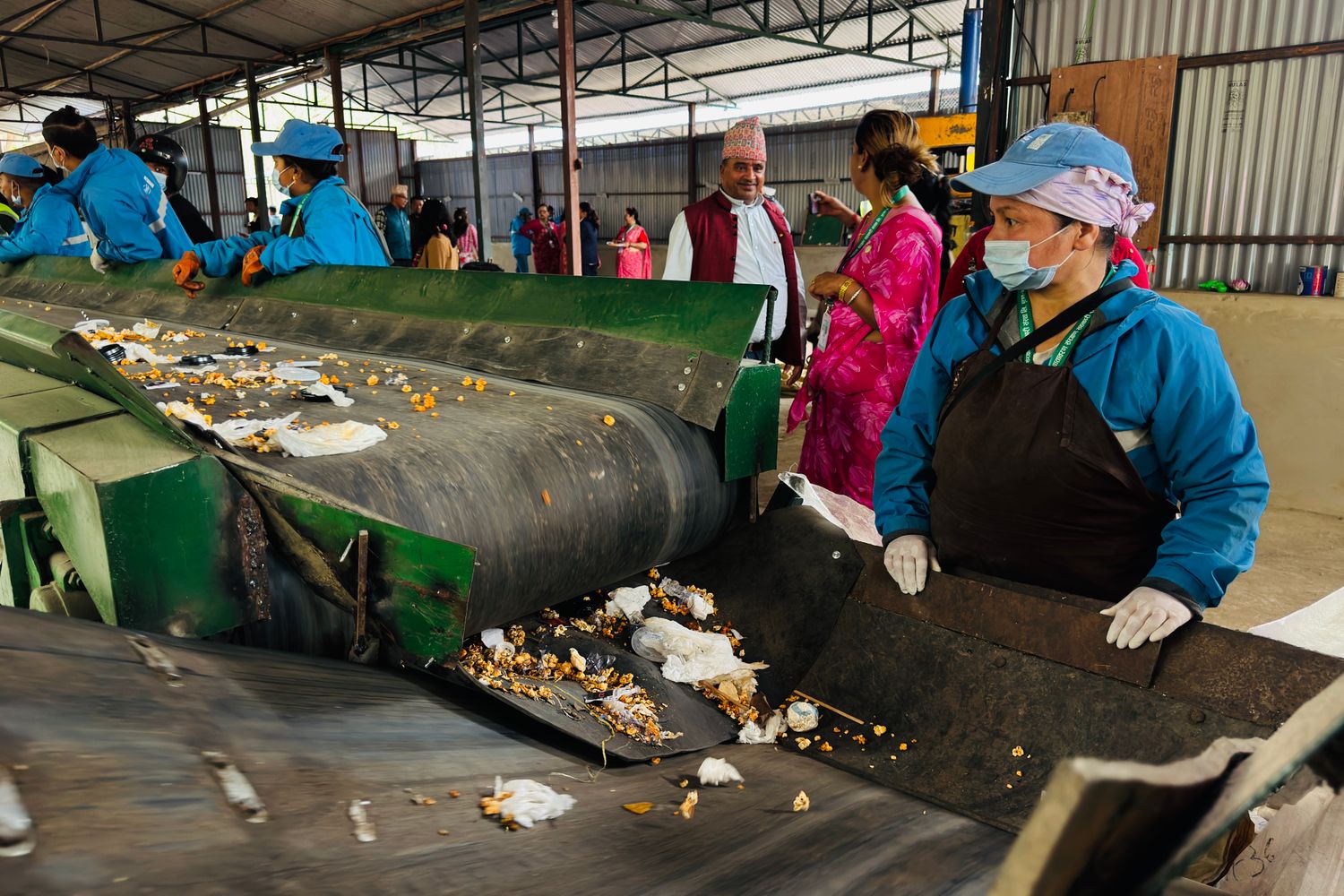 Recyclable materials move along sorting lines at a regional recycling facility