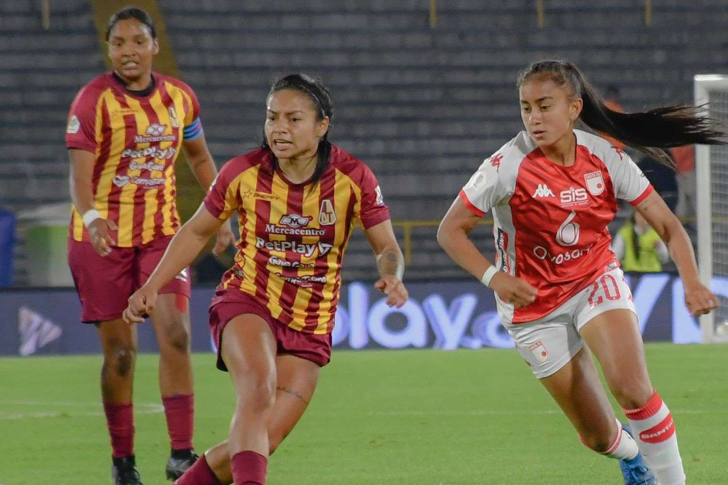 College women's soccer players competing during a championship match