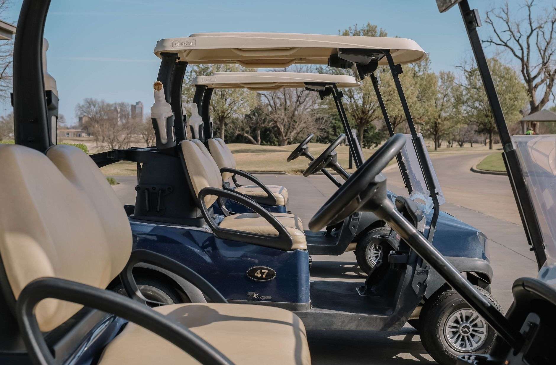 Rental golf cart parked on a coastal Alabama street