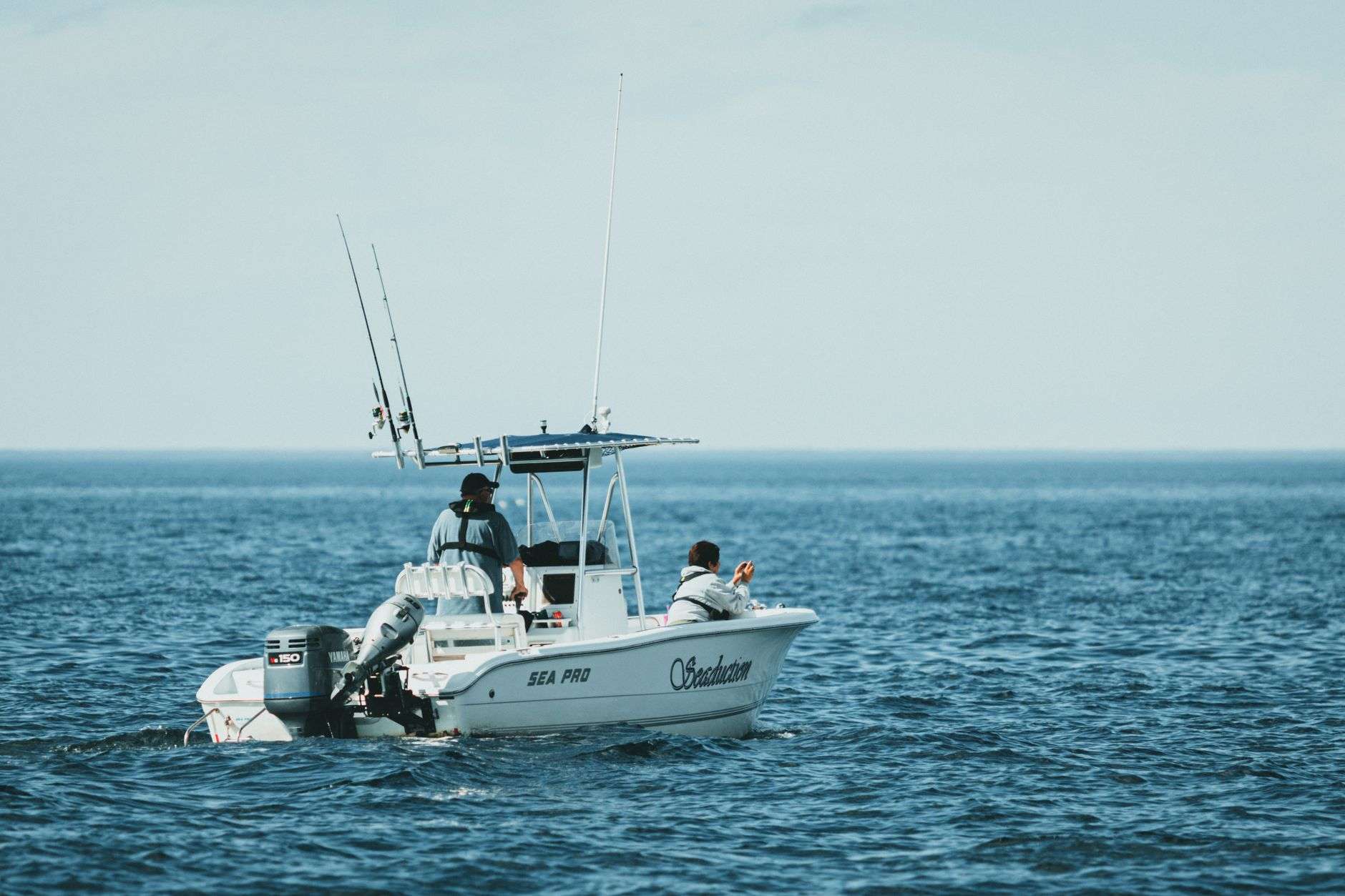 Offshore fishing boat heading out to sea
