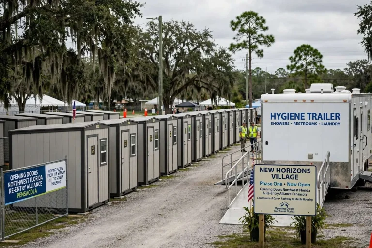 Illustration for the news story: Pensacola’s New Horizons Village Opens First Phase of Pallet Shelters for People Experiencing Homelessness