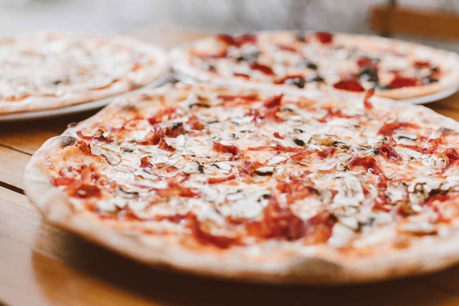 Close-up of fresh pizza slices ready to be served