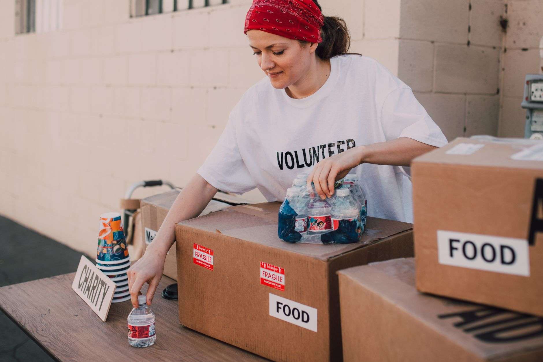 Volunteers with food donation boxes at a food pantry