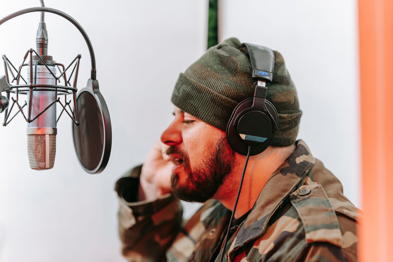 A recording studio setup with a microphone and headphones