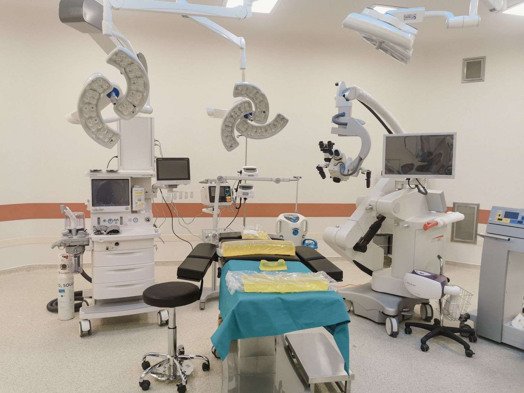 Surgeon operating a robotic-assisted surgical system console