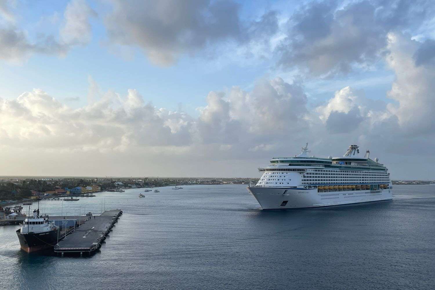 A cruise ship pulling into a Gulf Coast port in the morning
