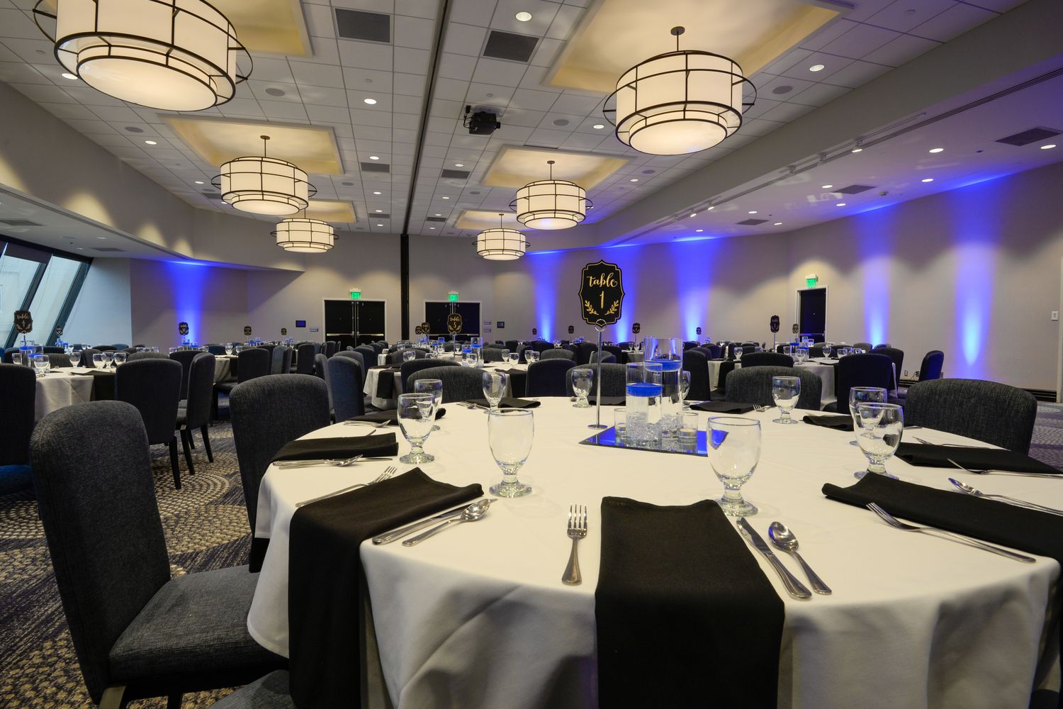Banquet ballroom set for a sports hall of fame induction ceremony in Mobile, Alabama