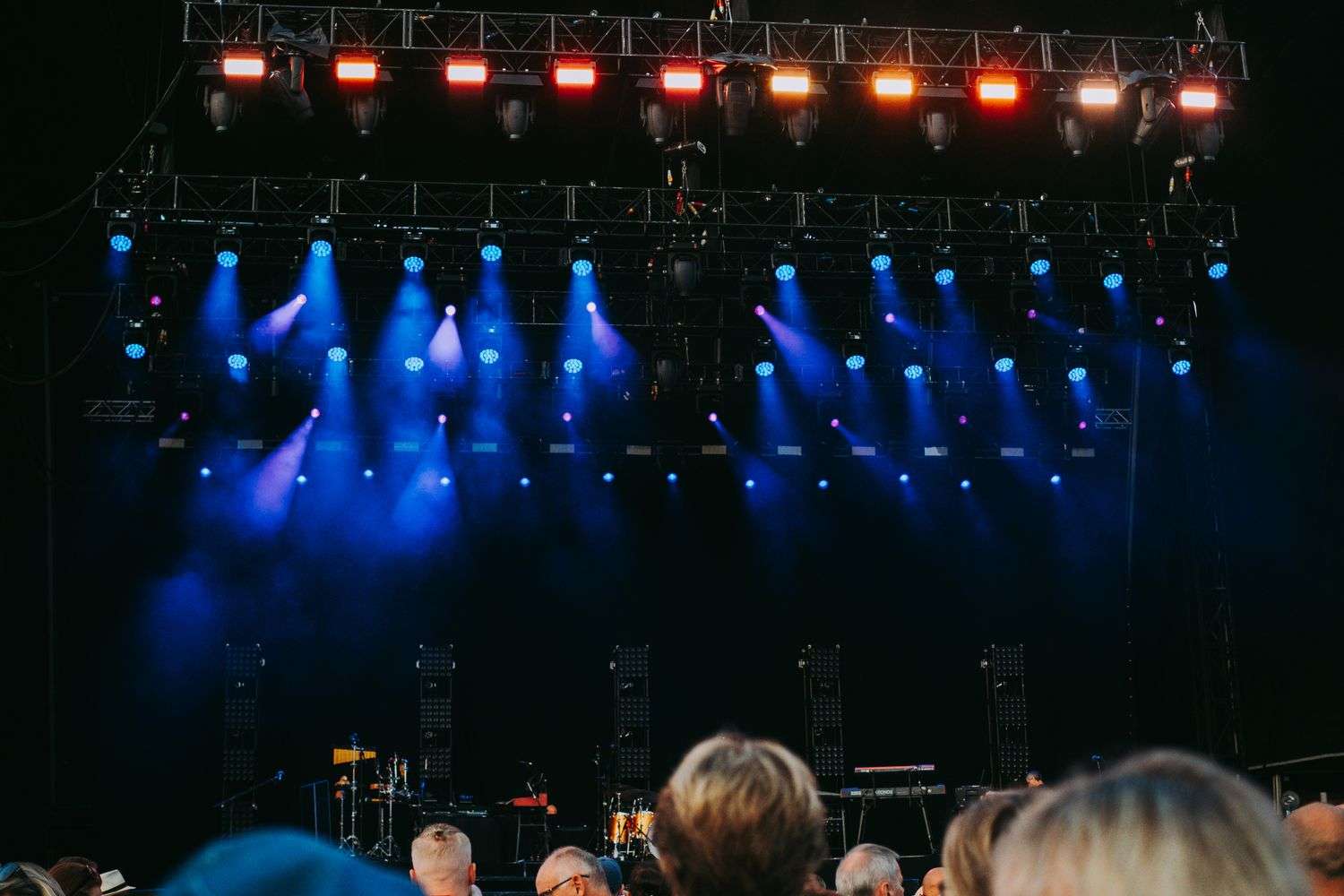 A festival stage lit up at night
