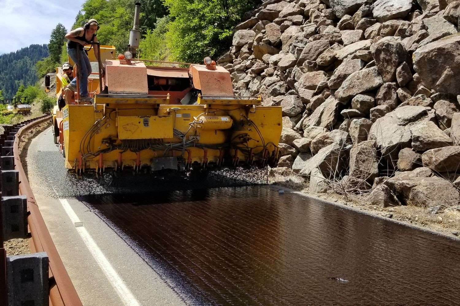 Construction crews working on highway bridge