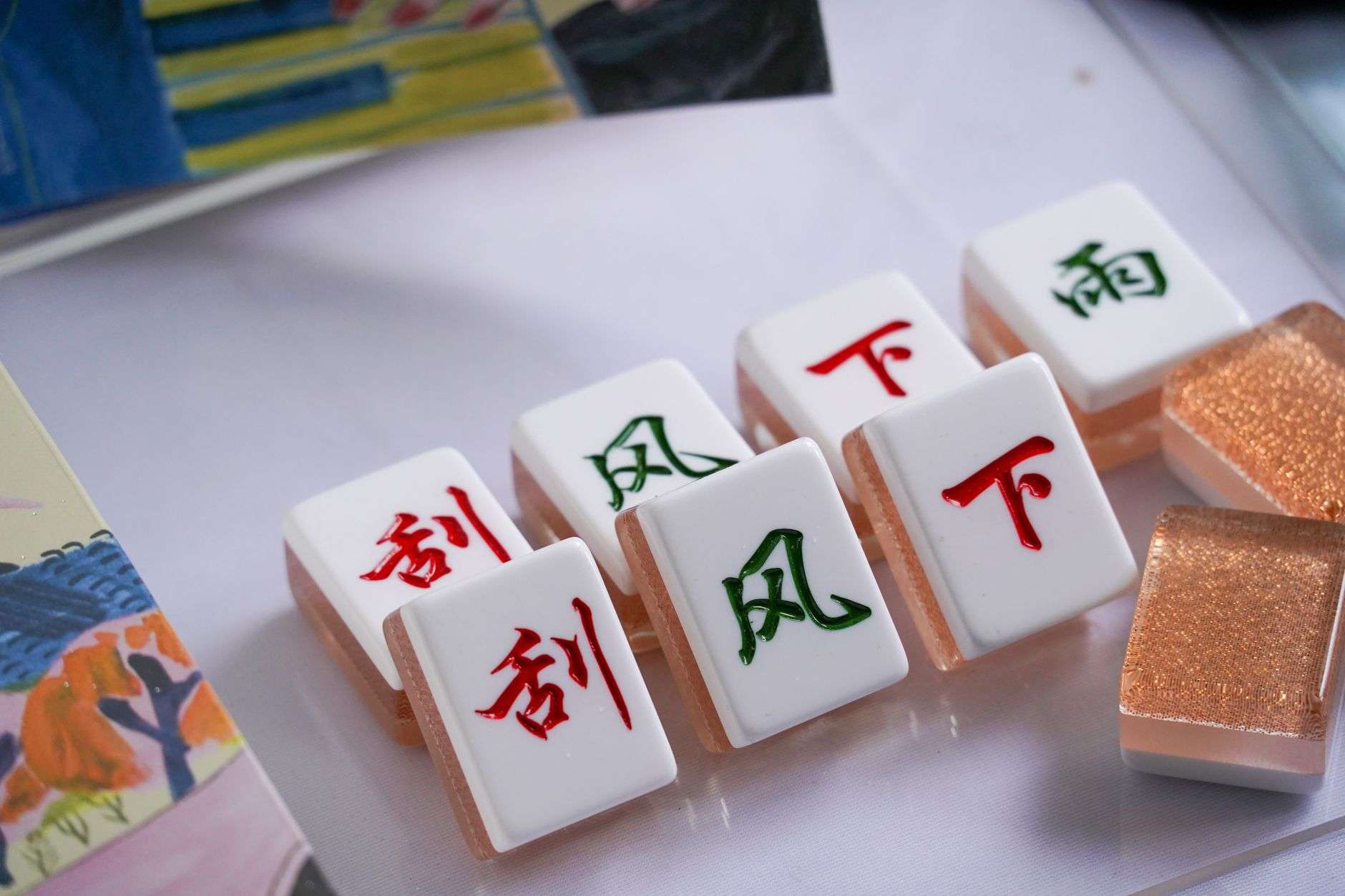 Mahjong tiles arranged on a table during a game