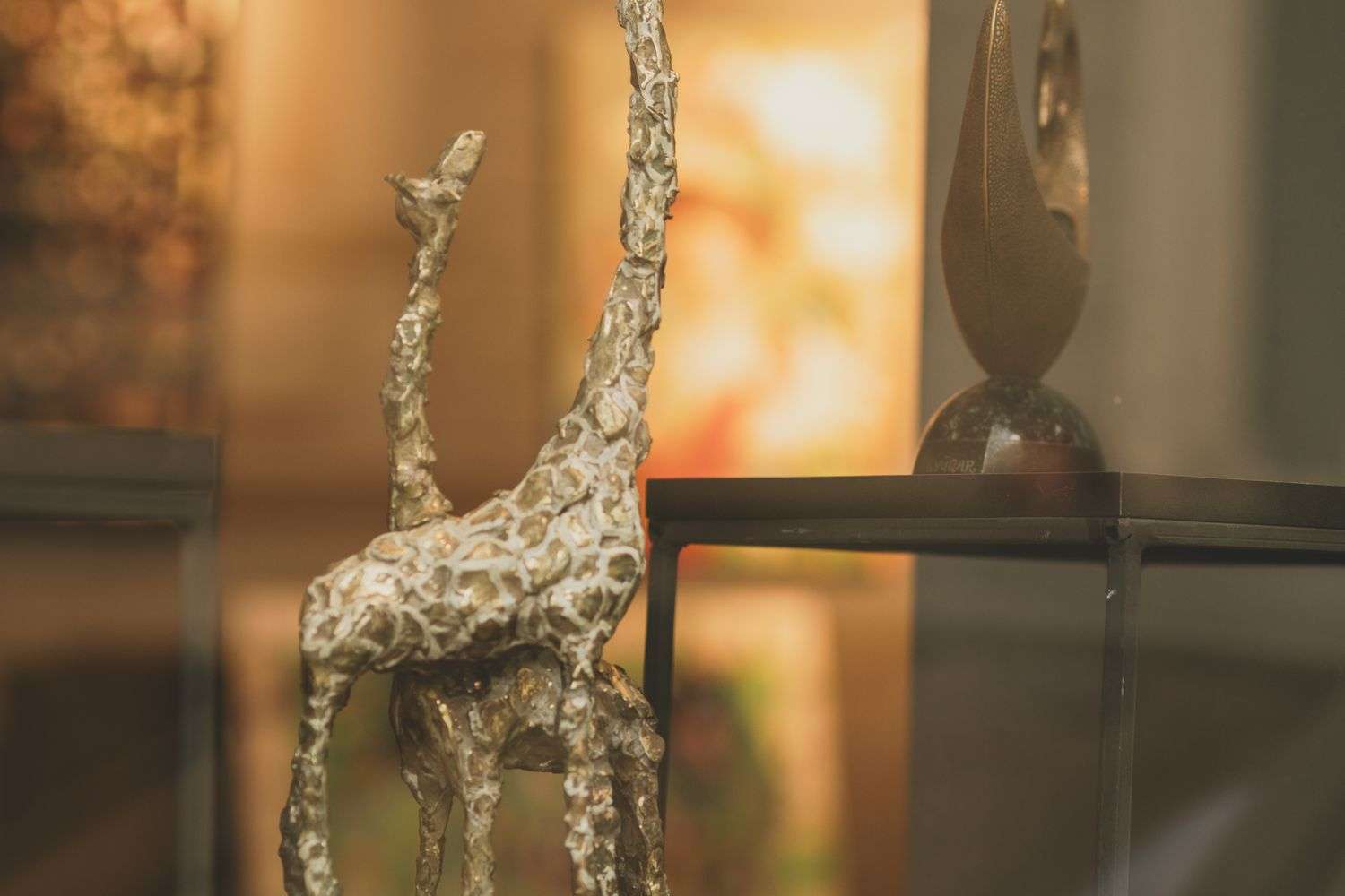 Visitors viewing artwork in a Fairhope gallery