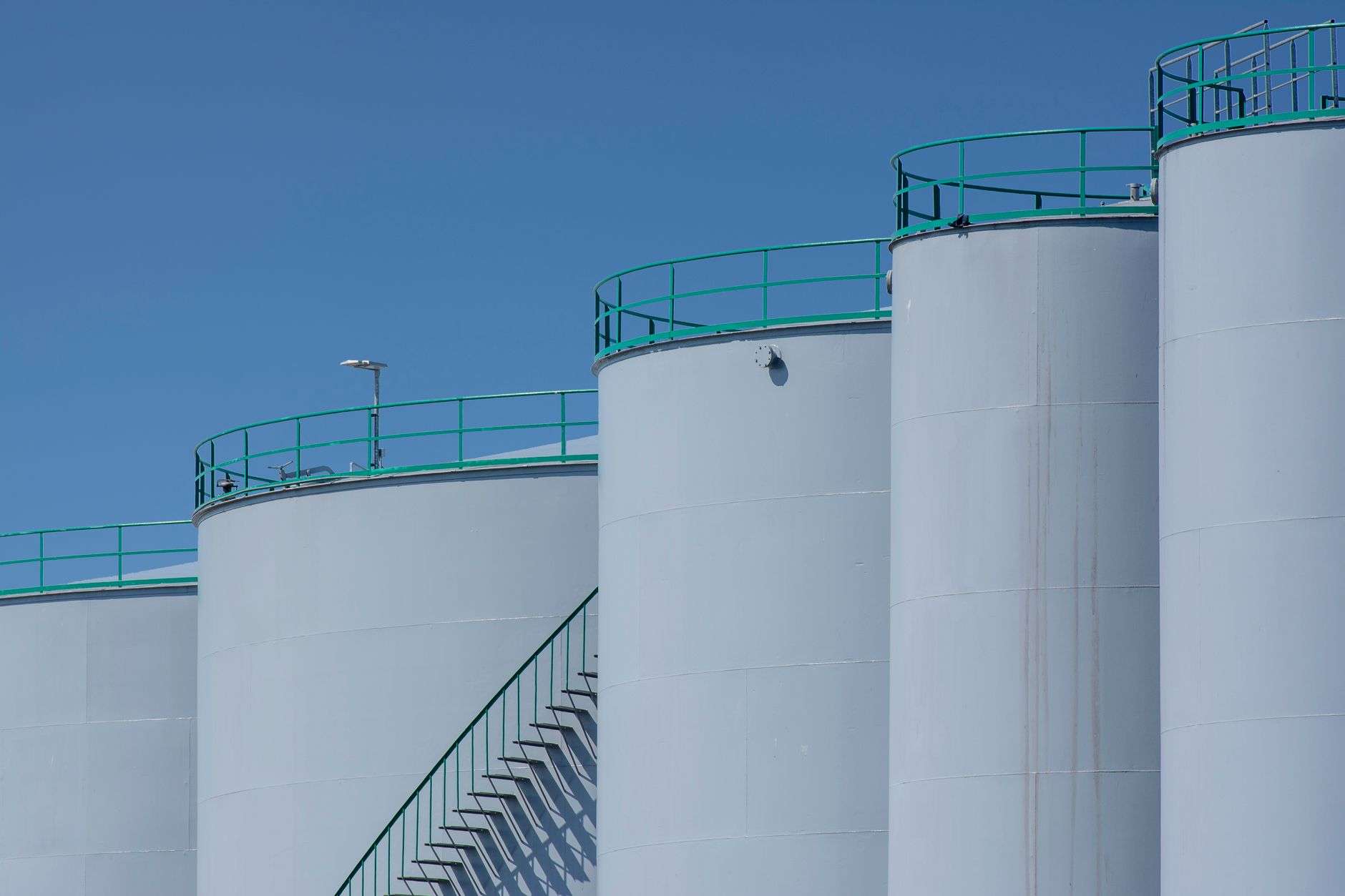 Industrial storage tanks at an energy facility