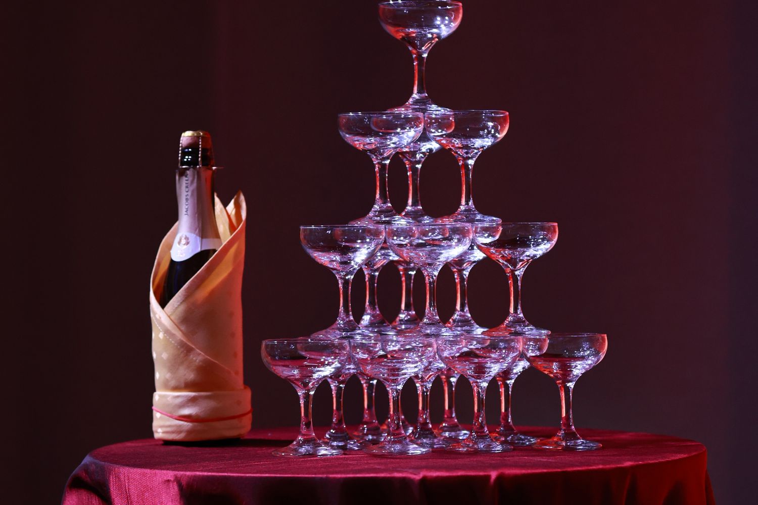 Elegant table setting with wine glasses at a charity gala event
