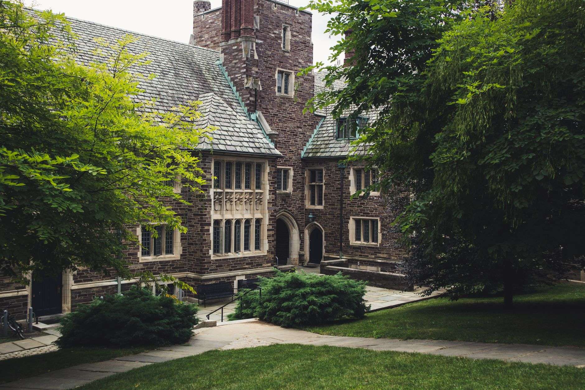 A historic community college building on a campus under renovation