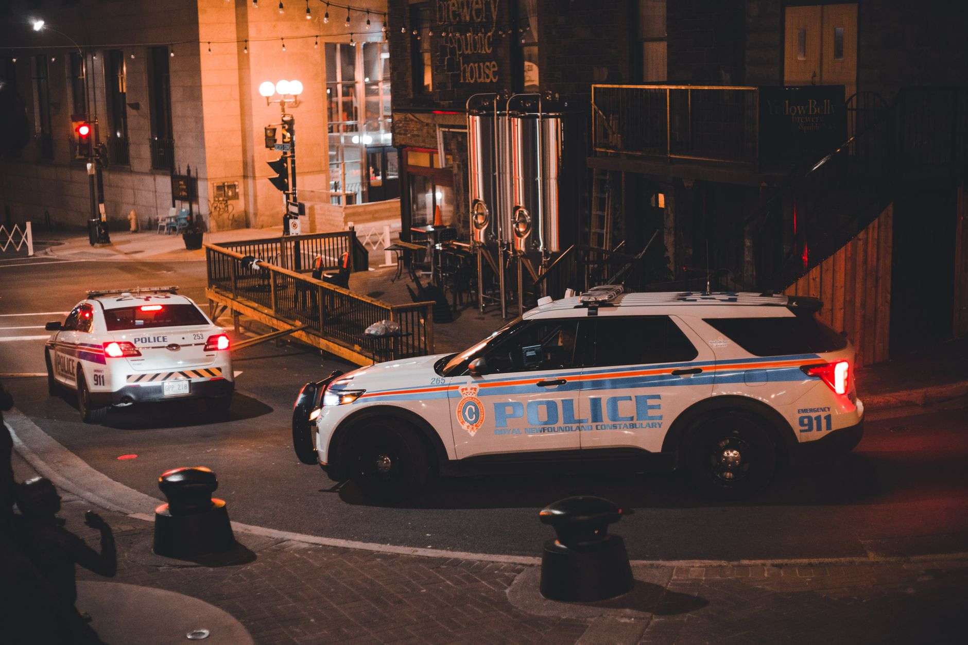 Police patrol car lights illuminated at night during a law enforcement response
