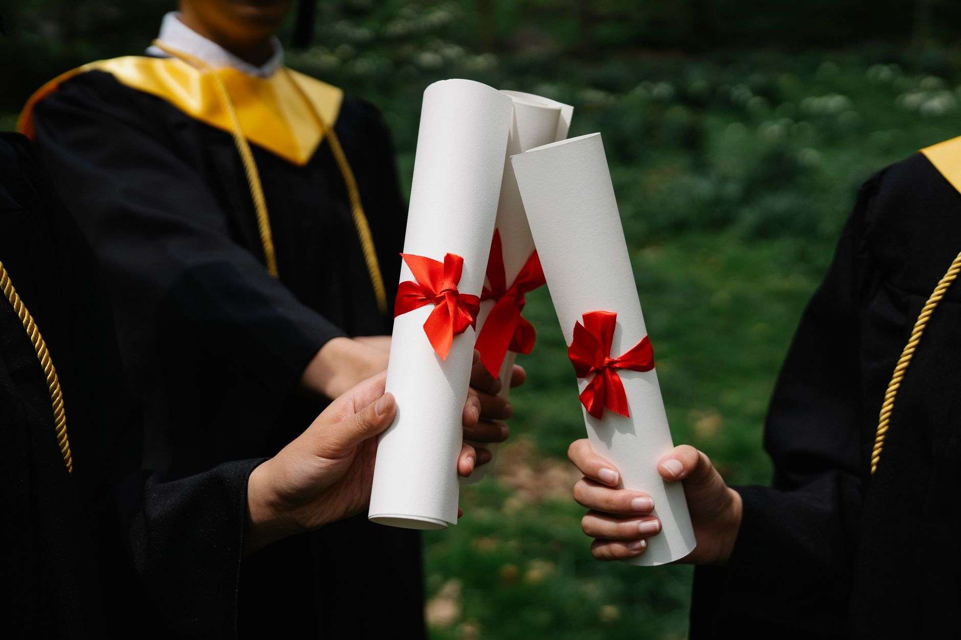 Graduation cap and diploma symbolizing academic honors achievement
