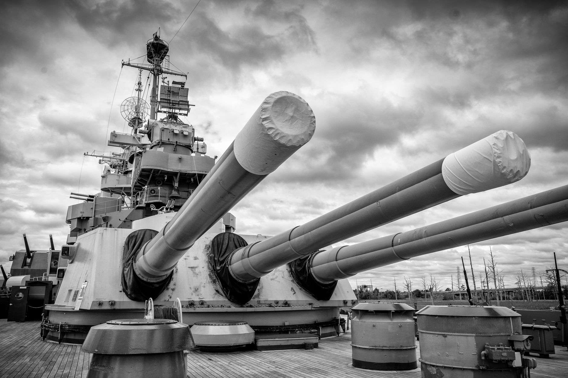 Large naval guns aboard a historic World War II battleship