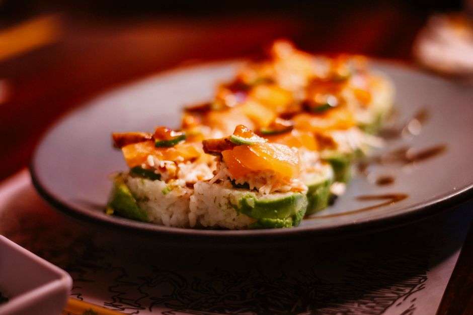 Assorted fresh sushi rolls served on a plate at a Japanese restaurant