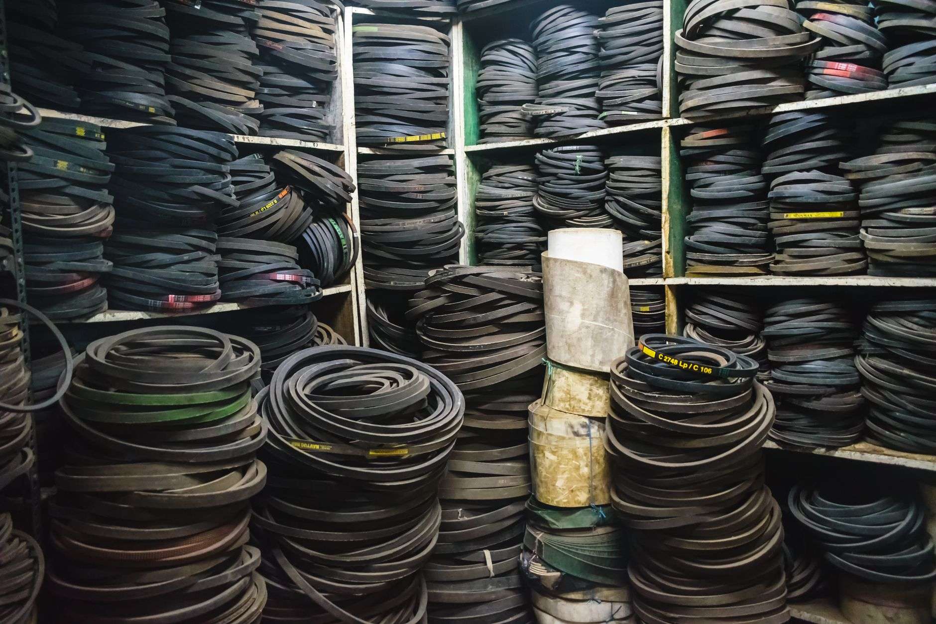 Warehouse shelving stocked with automotive parts inventory