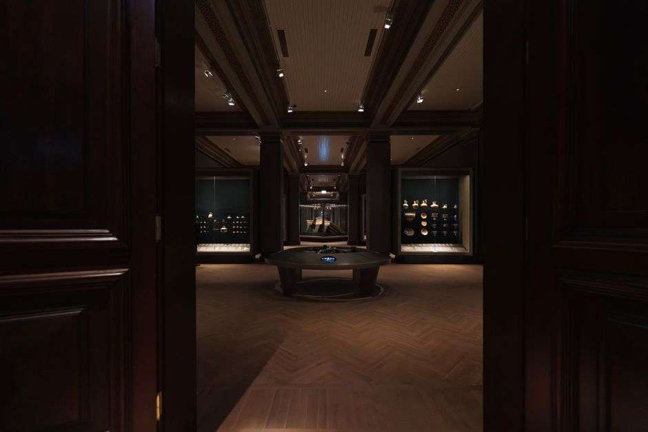 A museum gallery hall with exhibits and displays