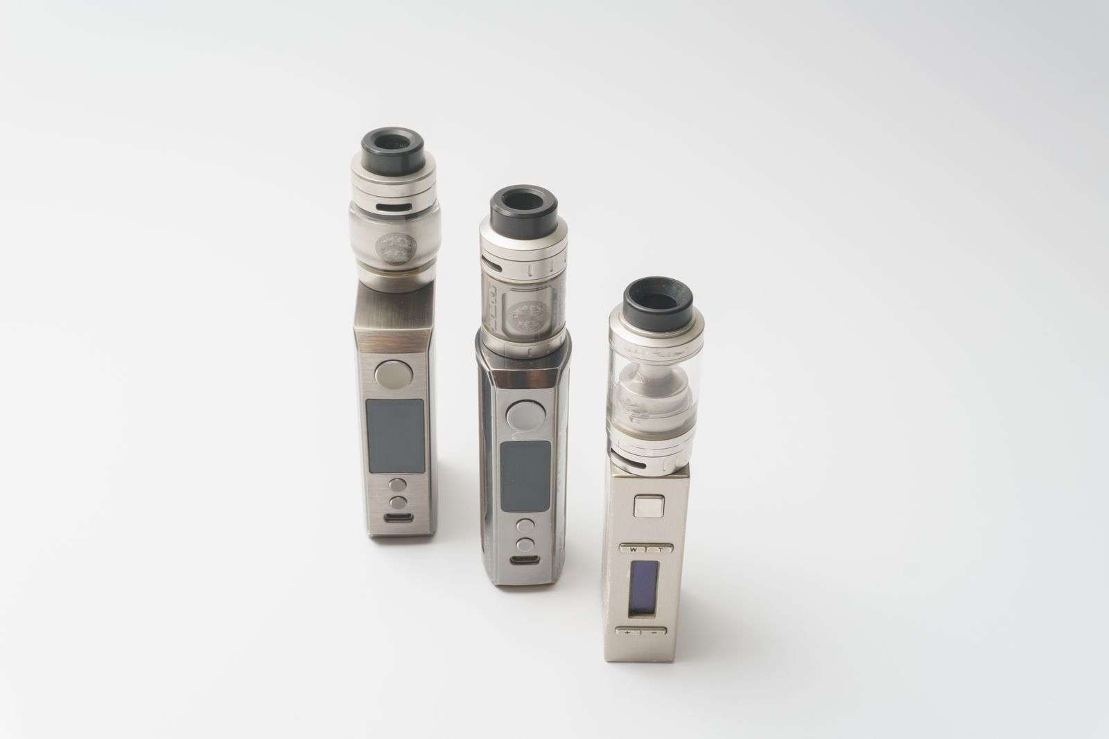 Person holding an electronic cigarette device