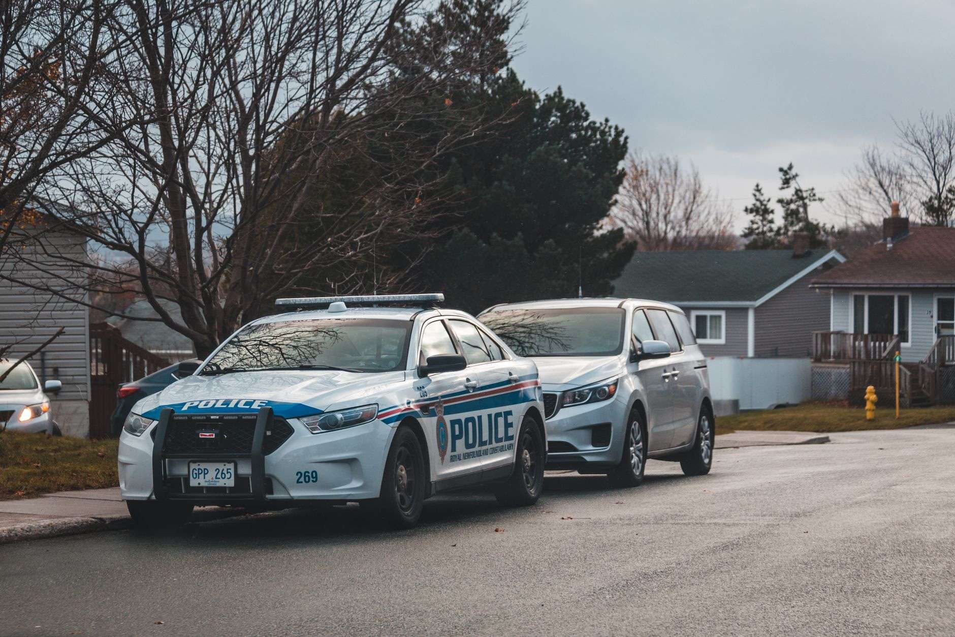 Police patrol vehicle parked outside a municipal police building