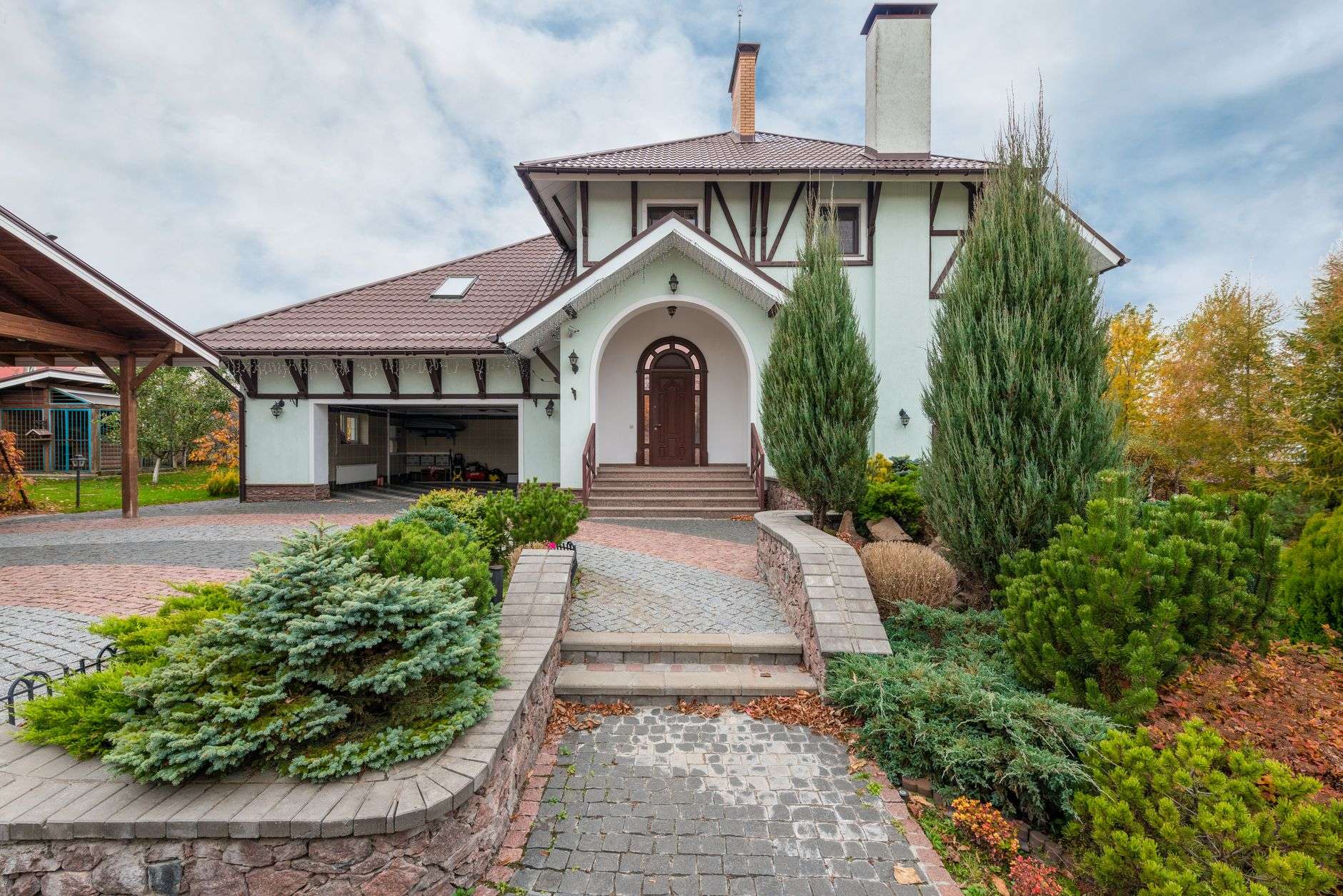 Well-landscaped residential front yard with flowering plants