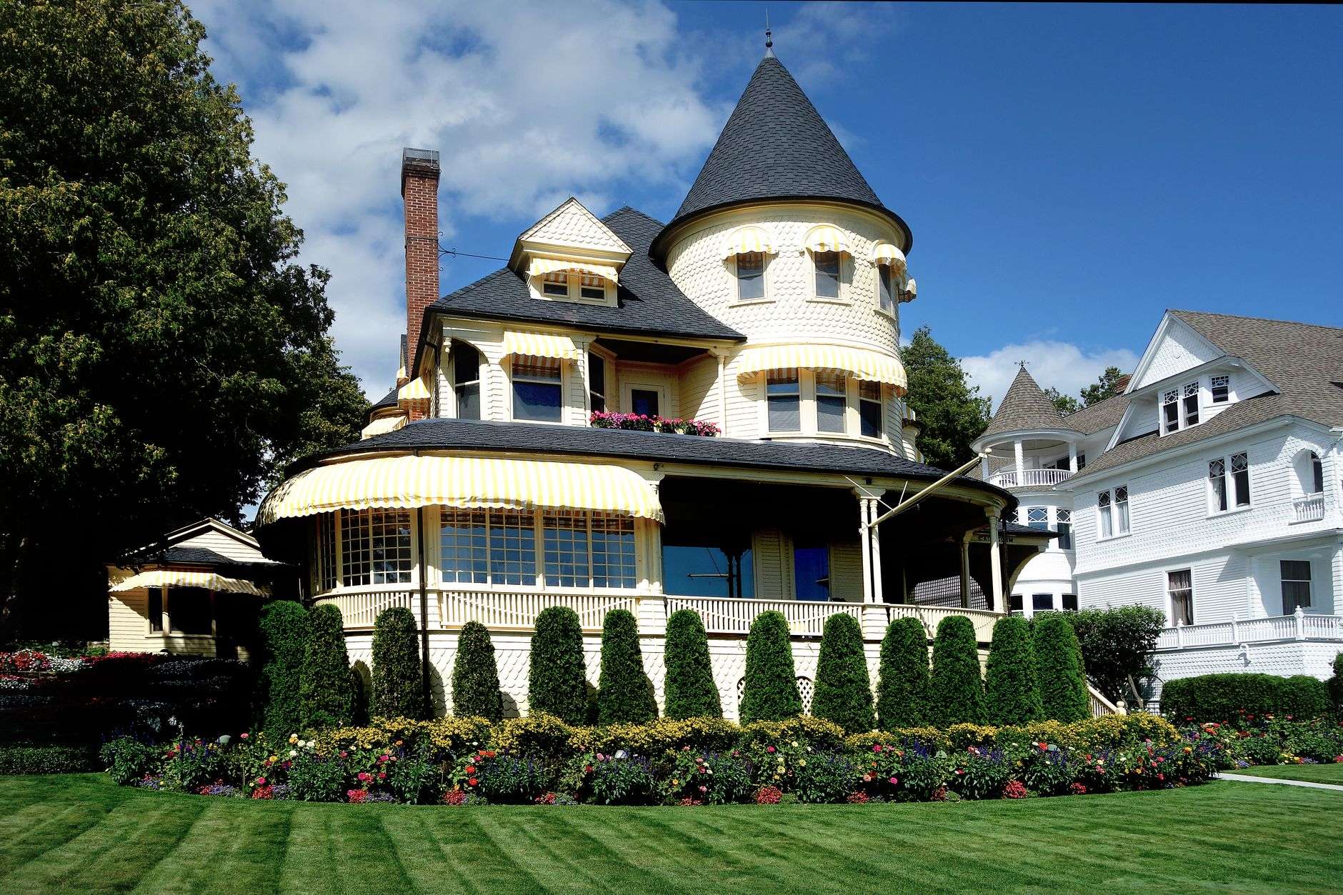 Weathered historic two-story house with a front porch