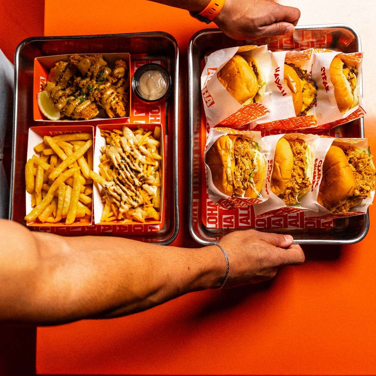 A burger and fries, illustrating the menu at a newly opened fast-casual restaurant