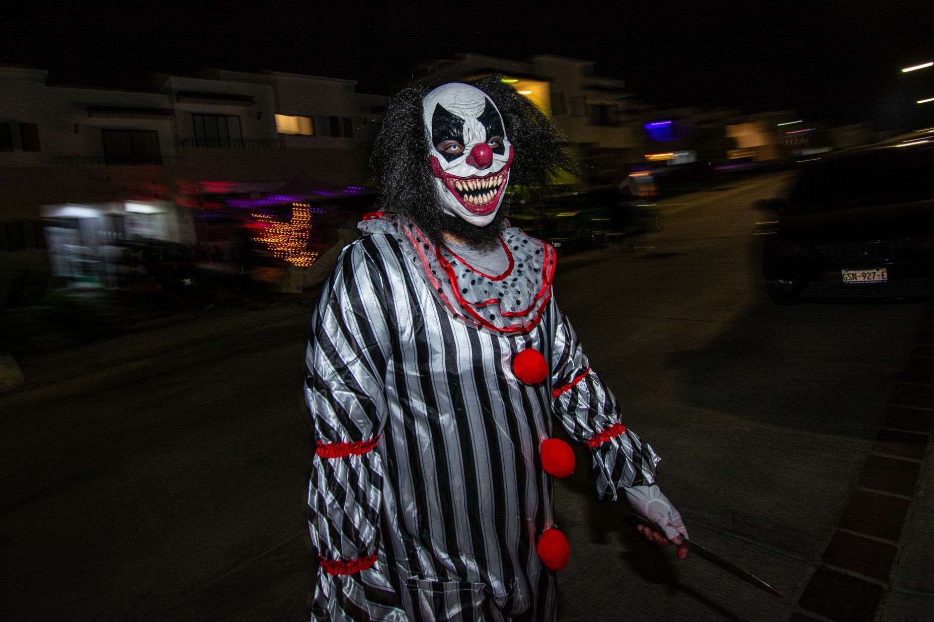A clown figure in dim light, recalling the 2016 clown sightings that reached Flomaton