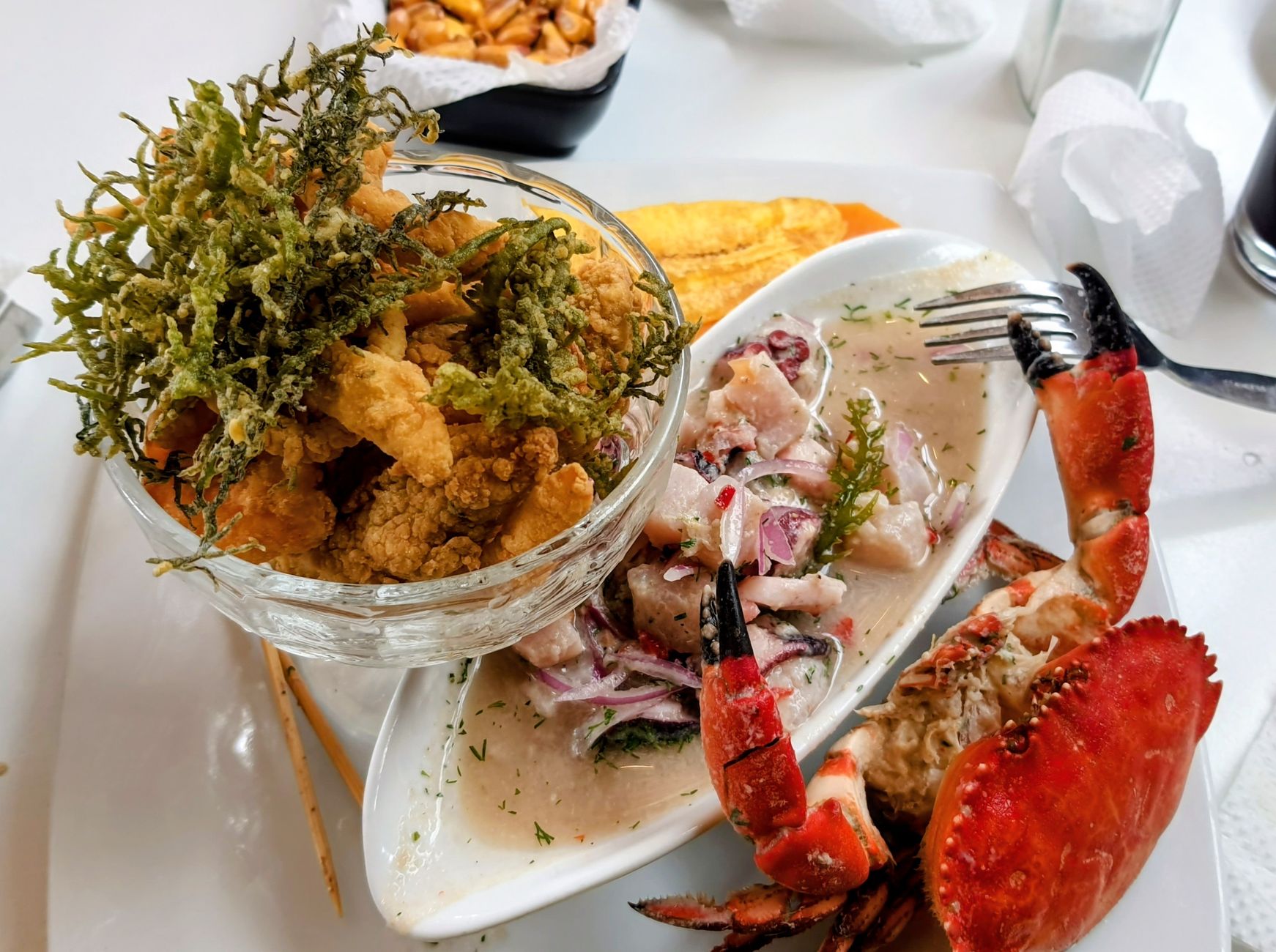 A platter of fried seafood served at a casual coastal restaurant
