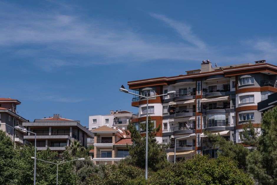 Exterior view of a modern apartment complex with balconies