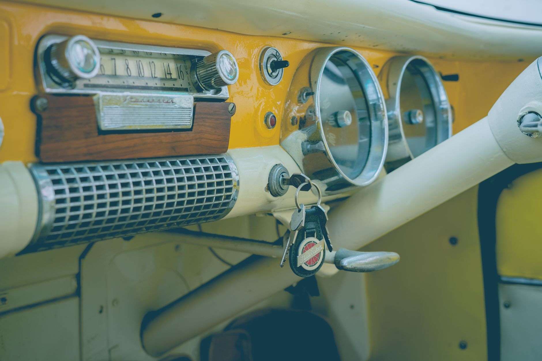 A steering wheel and car keys, illustrating a high school driver education class on impaired driving