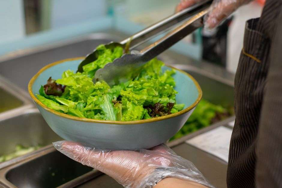 Fresh vegan dishes with vegetables prepared at a cafe