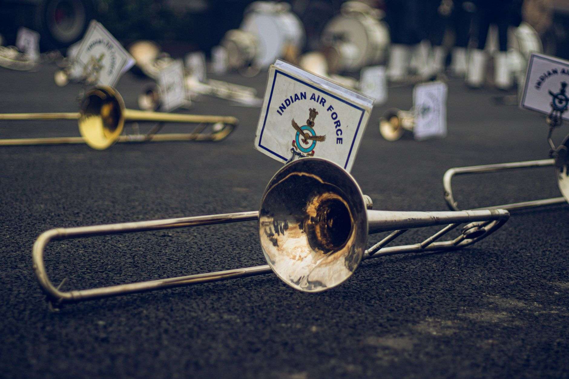 Brass band instruments including a trumpet and trombone