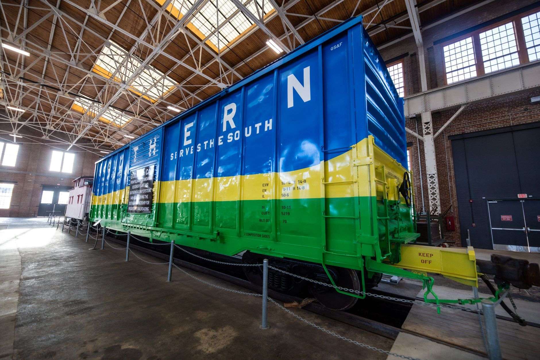 Historic railcar on display outdoors