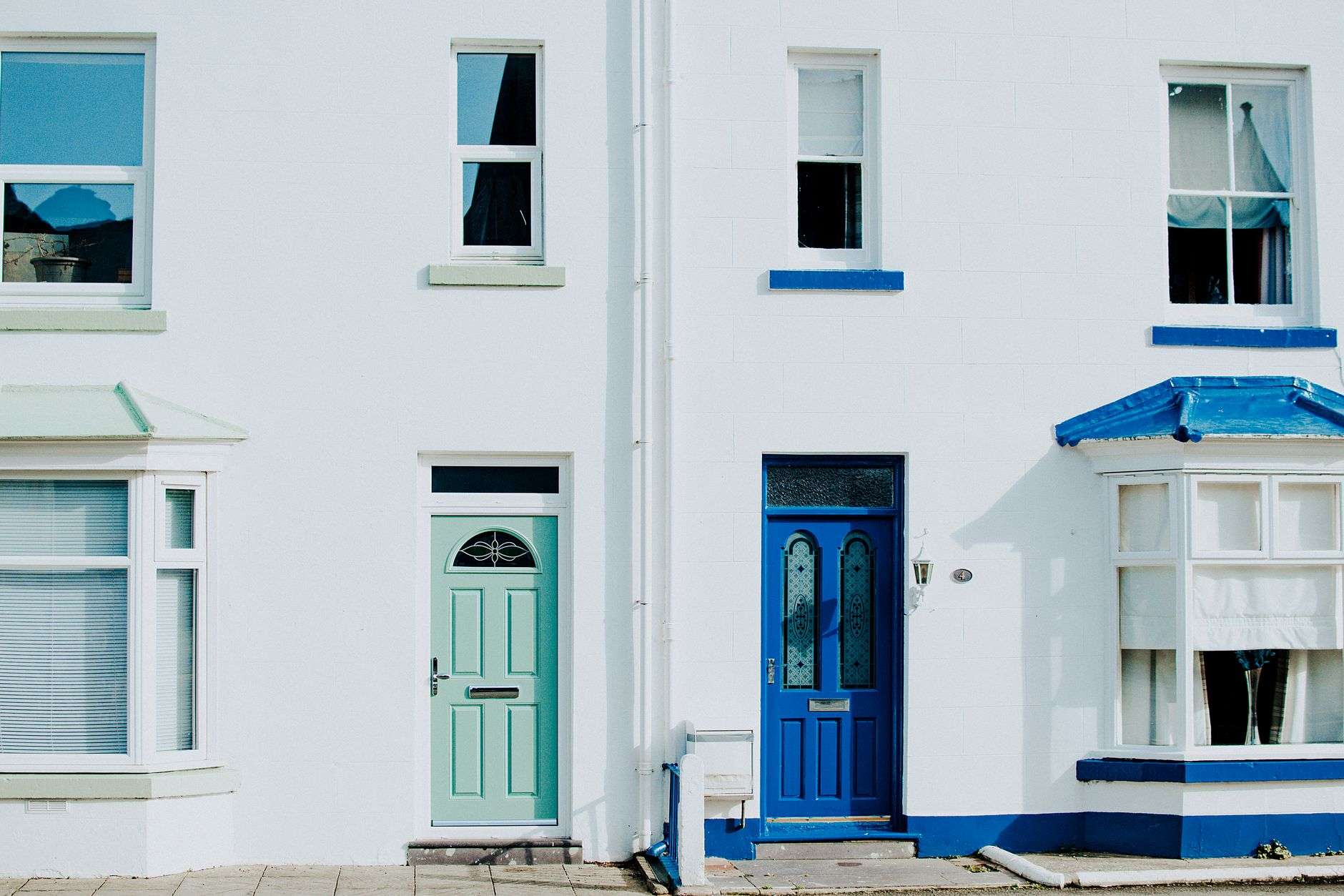 Front door of a suburban home illustrating Foley's door-to-door solicitation rules