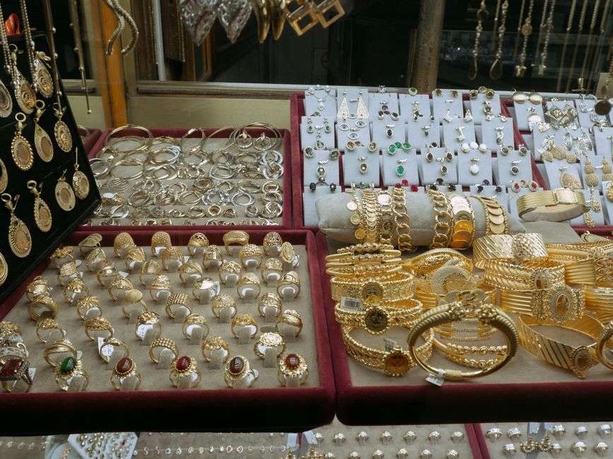 Fine jewelry display case with rings and watches in a jewelry store