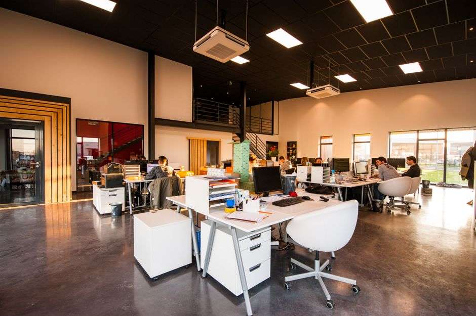 Advertising professionals collaborating in a modern downtown office