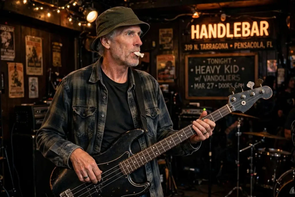 Illustration for the news story: Heavy Kid and the Long Game of Pensacola’s Hardest-Working Bass Player