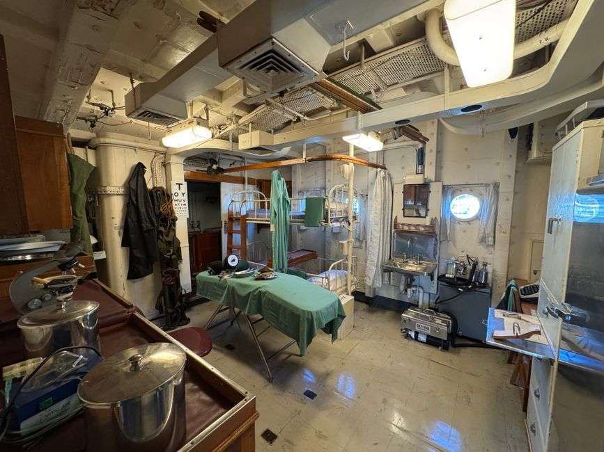 Vintage medical instruments and equipment in a preserved historic operating room