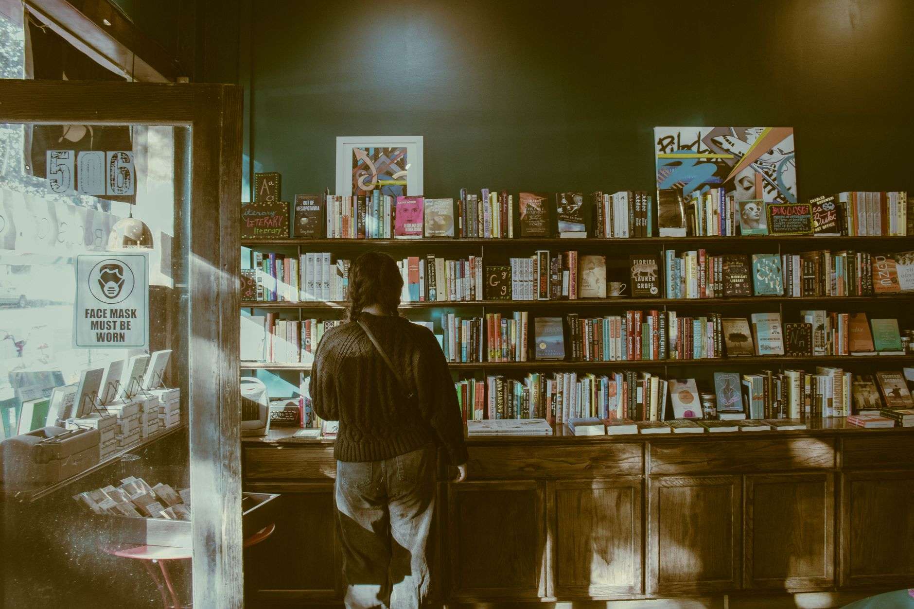 Shelves of books inside an independent bookstore, illustrating a long-running family-owned bookshop