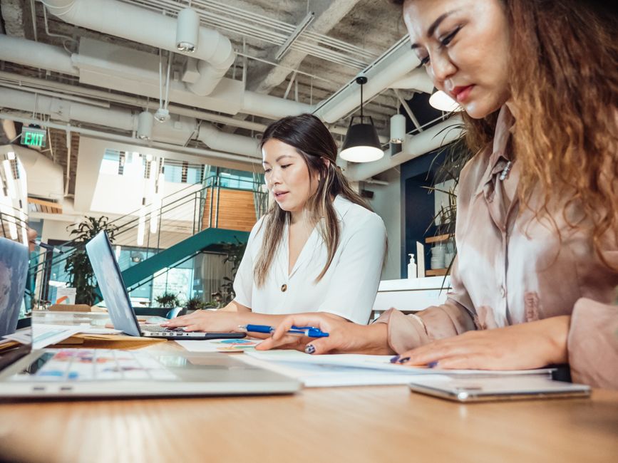 Entrepreneurs working together in a modern downtown coworking space