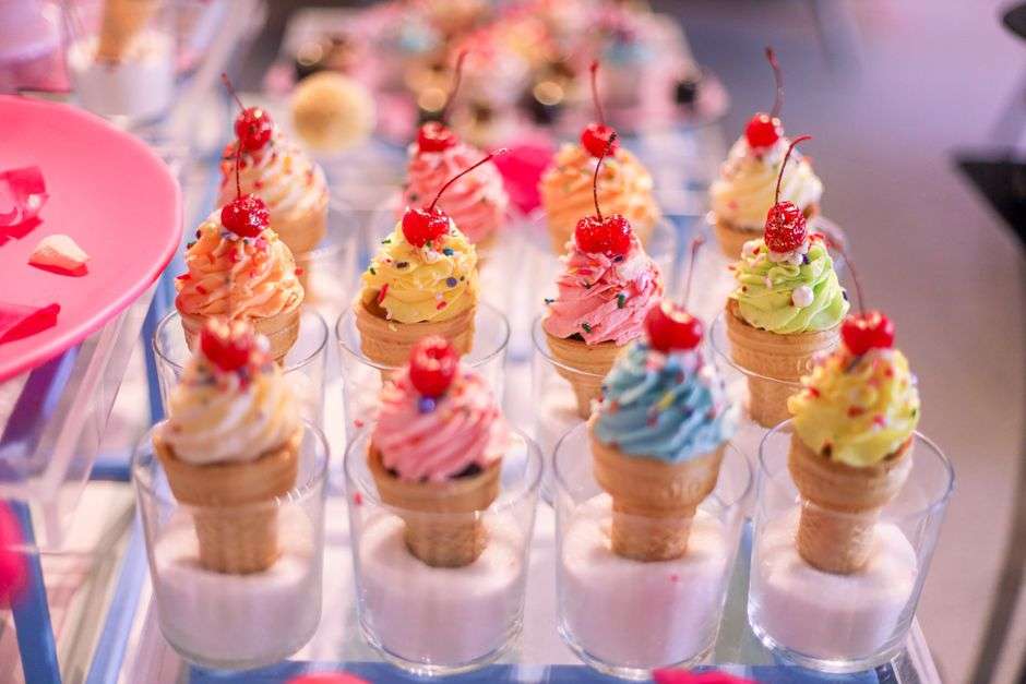Cups of colorful Italian ice, a refreshing frozen dessert