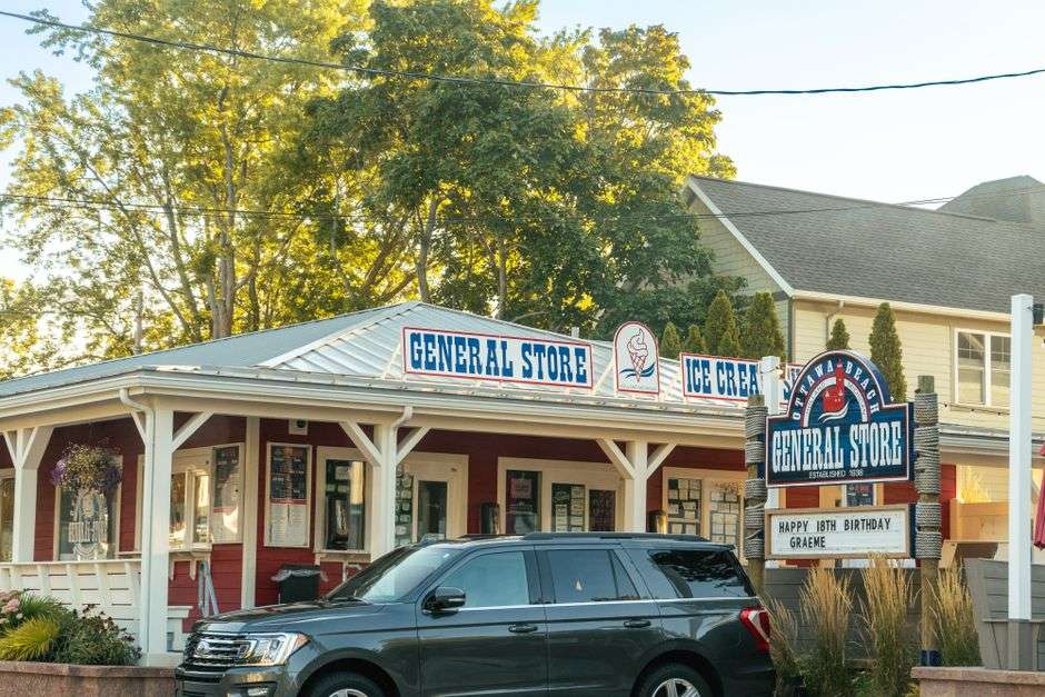 A historic small-town store building with a porch in Magnolia Springs, Alabama