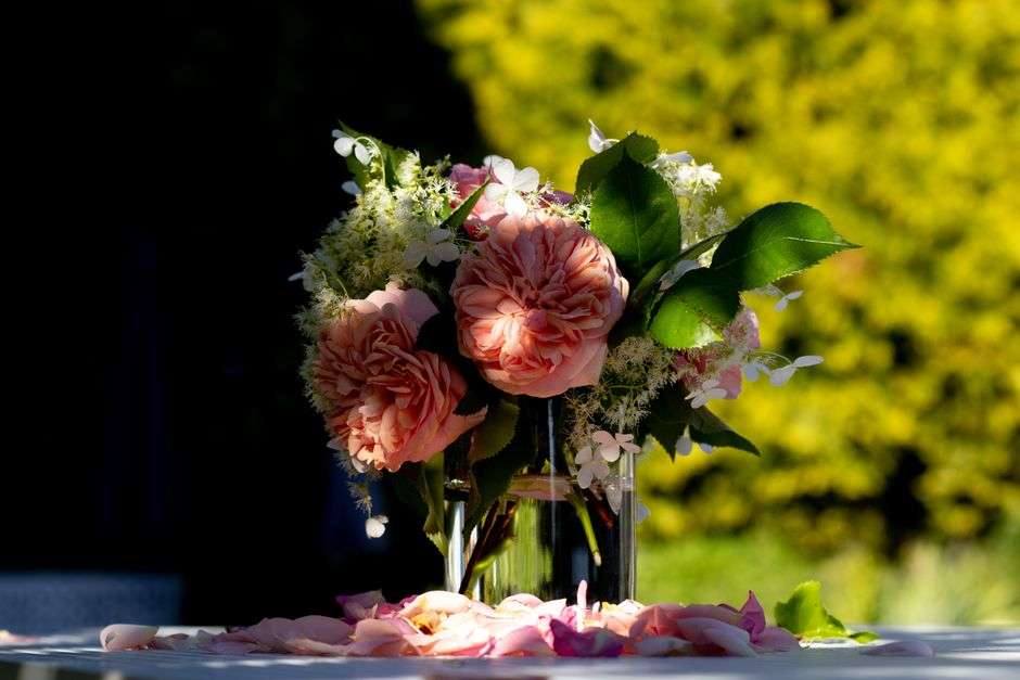 Lush bouquet of fresh garden roses and greenery arranged garden-style