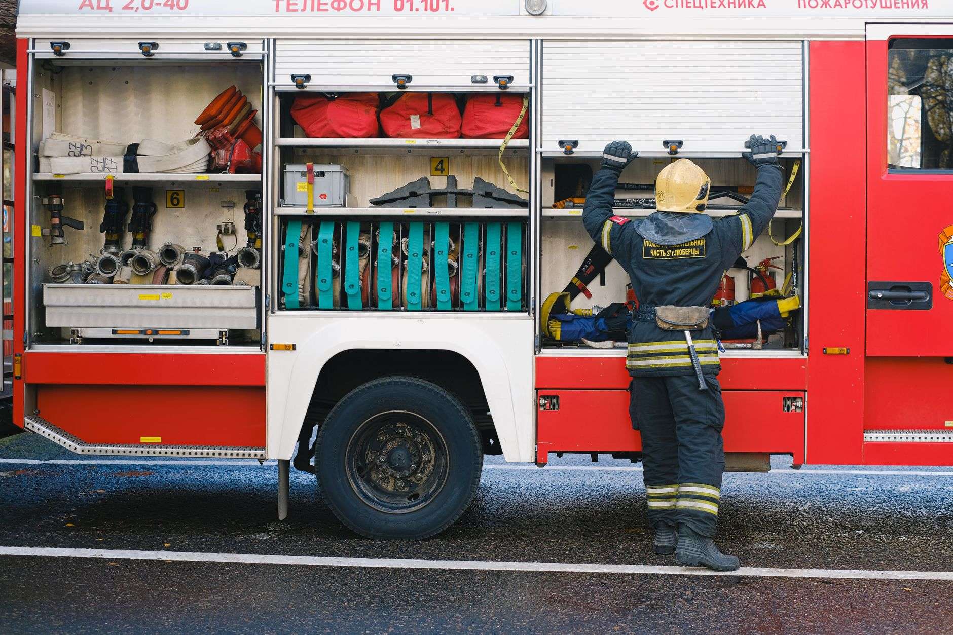 Emergency response vehicles with lights at a roadway crash scene