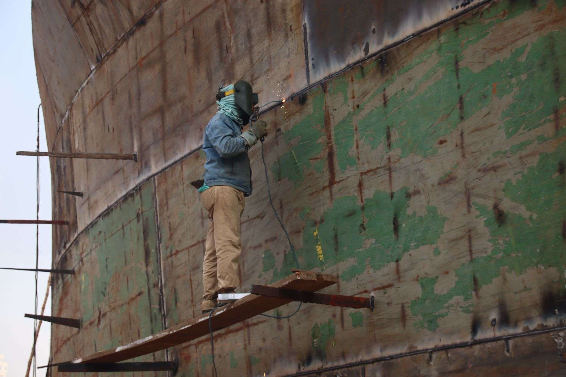 A vessel under construction at a working shipyard, illustrating coastal Alabama shipbuilding