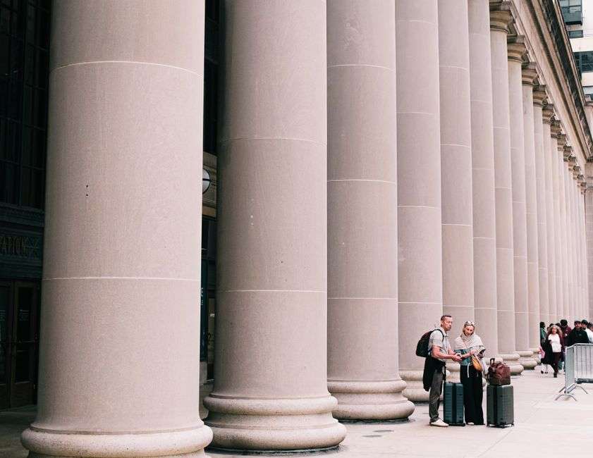 Stone columns stand at the entrance of a county courthouse