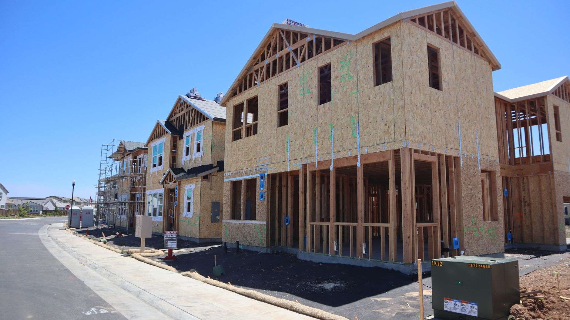 New residential homes under construction in a neighborhood
